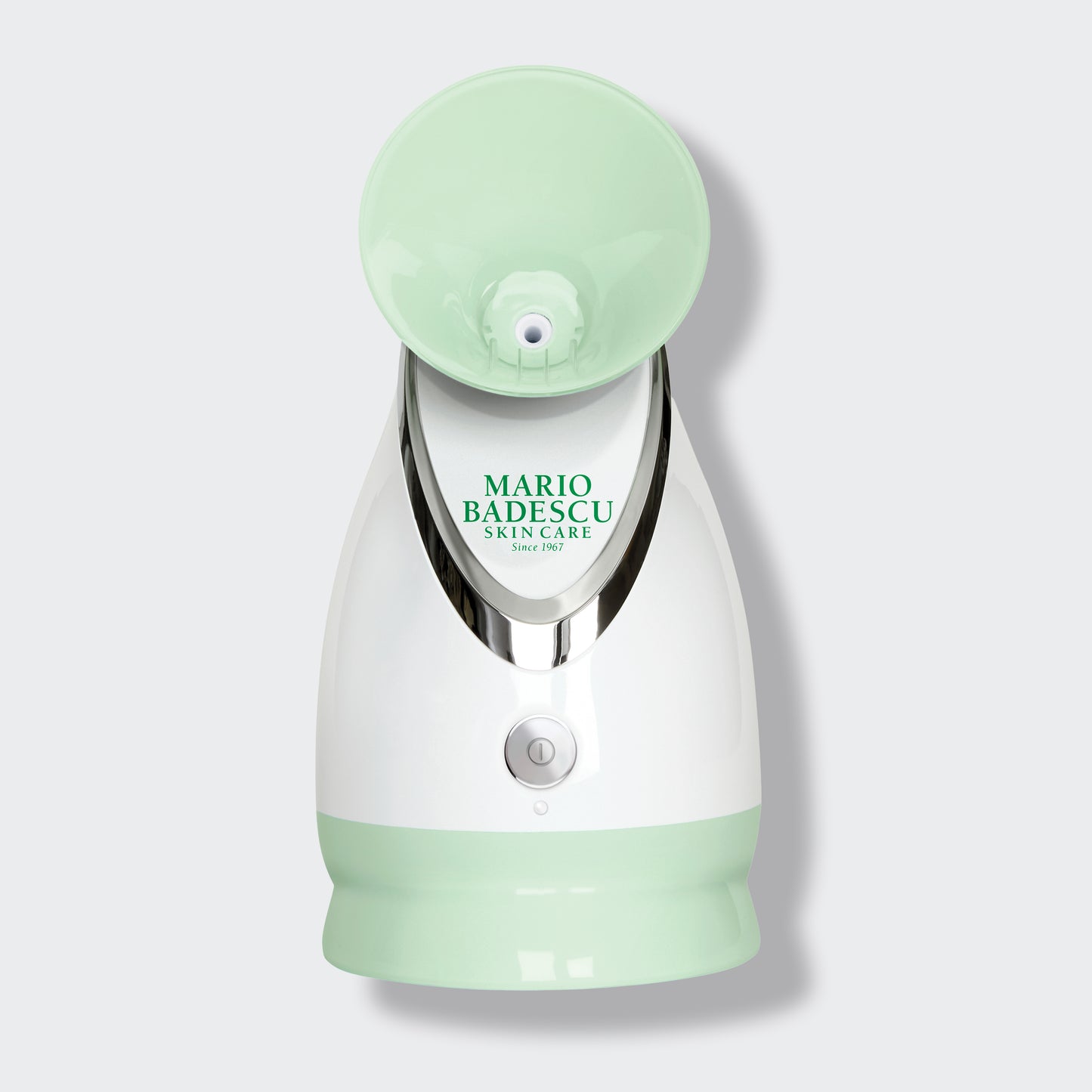 Mario Badescu skin care device with green top and base on a white background