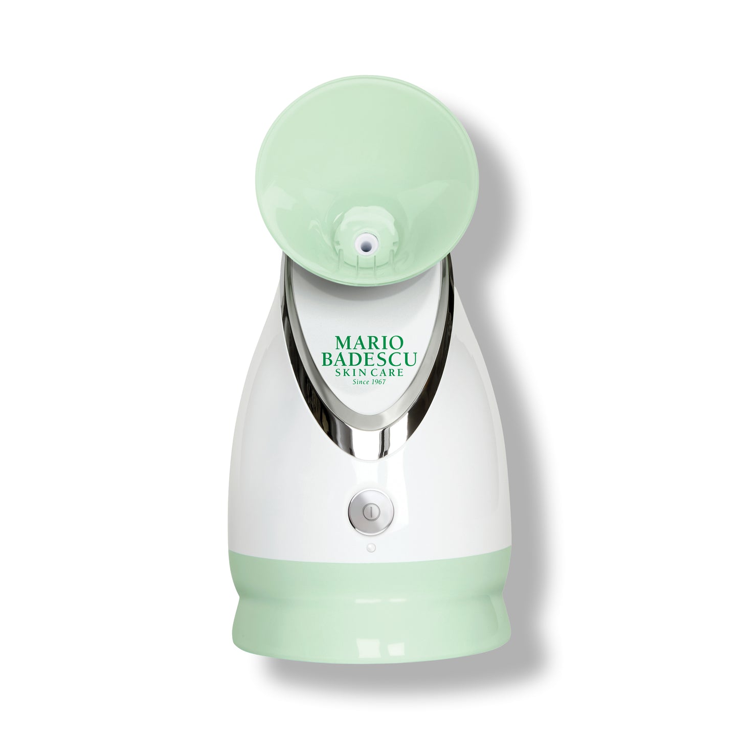 Green and white facial steamer with 'Mario Badescu' branding on a white background