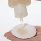 Demonstration showing how to use Chamomile Cleansing Lotion on a cotton pad
