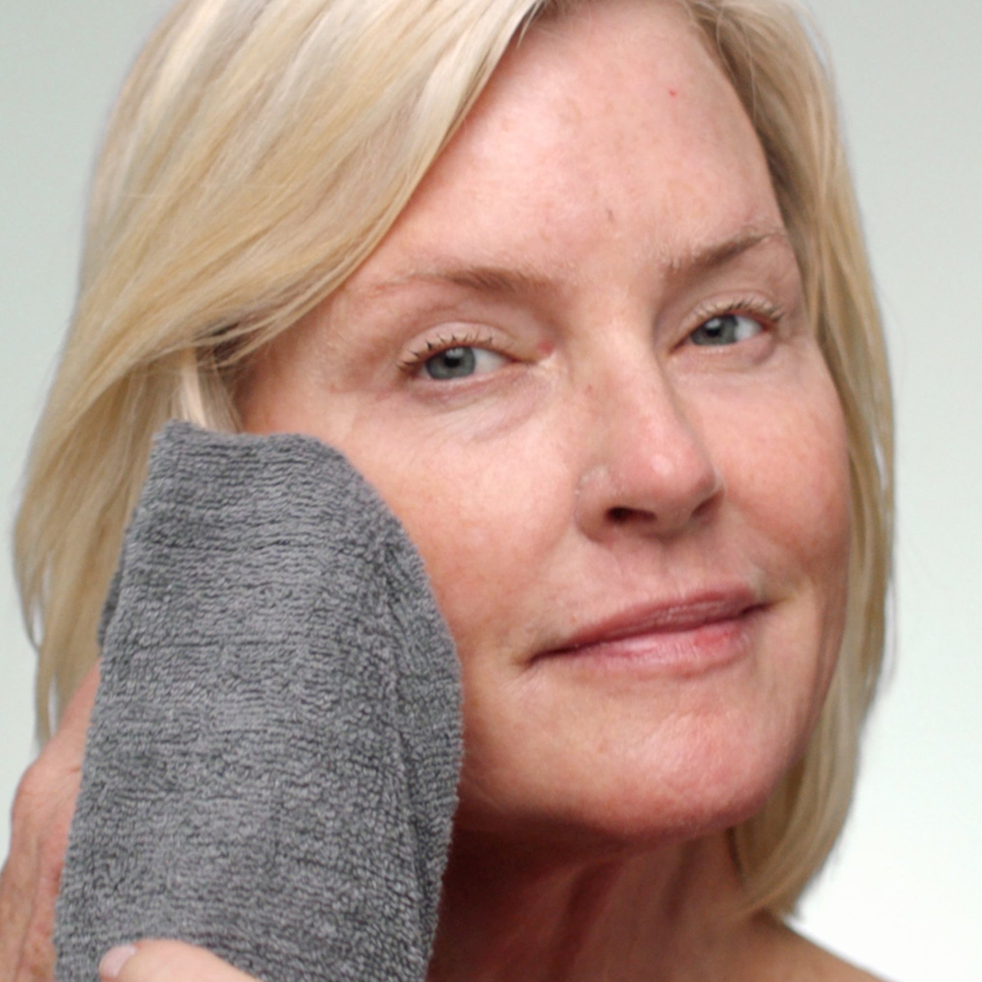 Woman with fresh, clean skin showing the results of Gentle Foaming Cleanser 